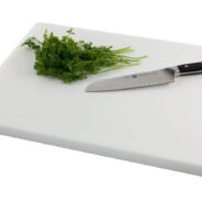 Why a Plastic Cutting Board and Paring Knife are Must-Have Tools in Your Kitchen
